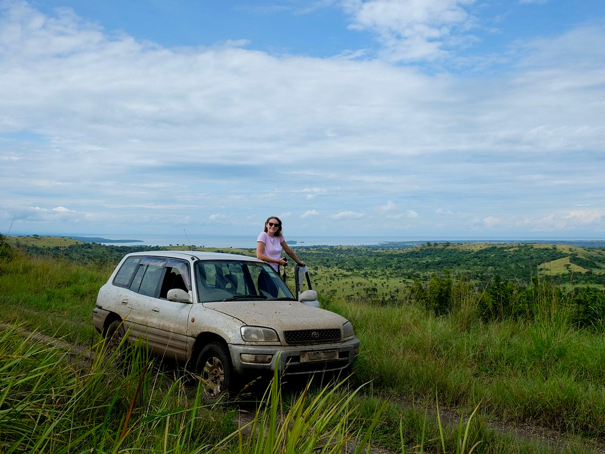 A solo traveler viewing wildlife in a Game Park in her rented Rav4 with a driver